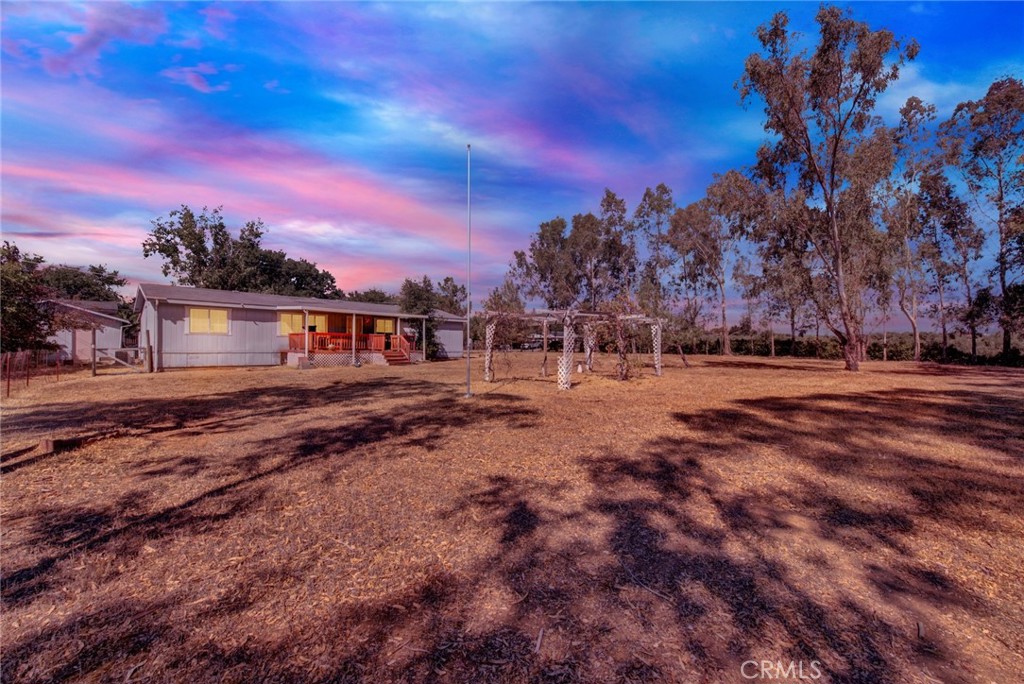 521 East Divisadero Corning, CA 96021 - Photo 2 of 54 a view of house with outdoor space