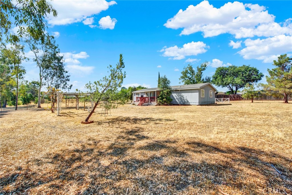 521 East Divisadero Corning, CA 96021 - Photo 25 of 54 a view of swimming pool with an outdoor space