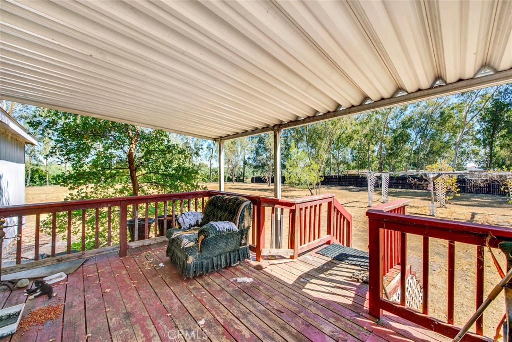 521 East Divisadero Corning, CA 96021 - Photo 28 of 54 a view of balcony with wooden floor and fence and floor