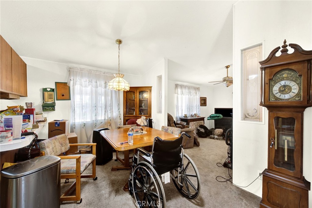 521 East Divisadero Corning, CA 96021 - Photo 33 of 54 a view of a dining room with furniture window and wooden floor