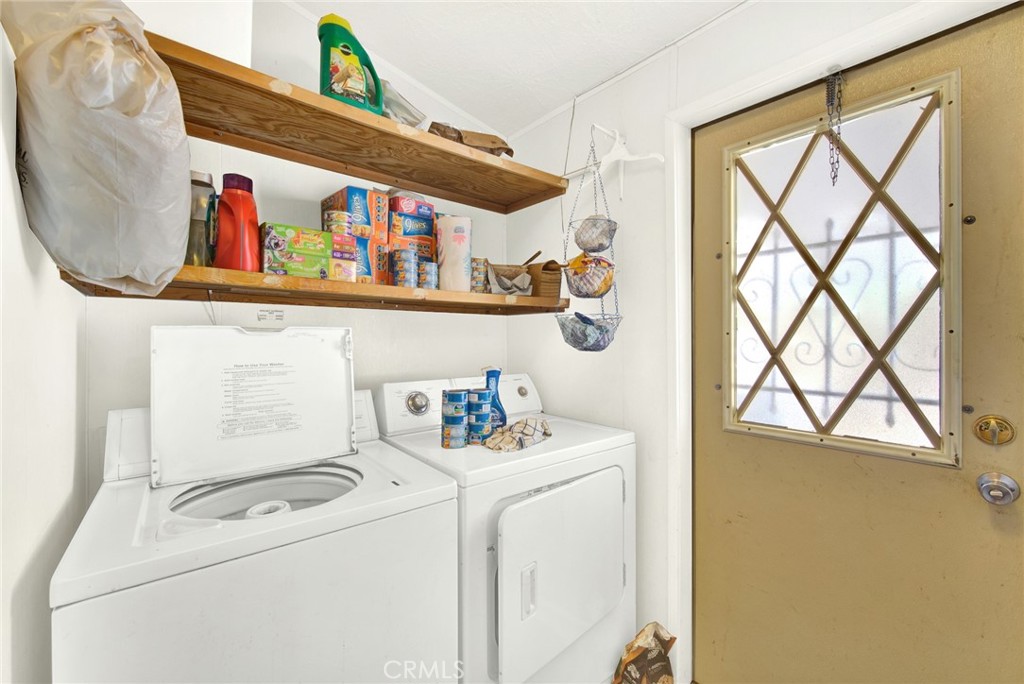521 East Divisadero Corning, CA 96021 - Photo 39 of 54 a utility room with dryer and washer