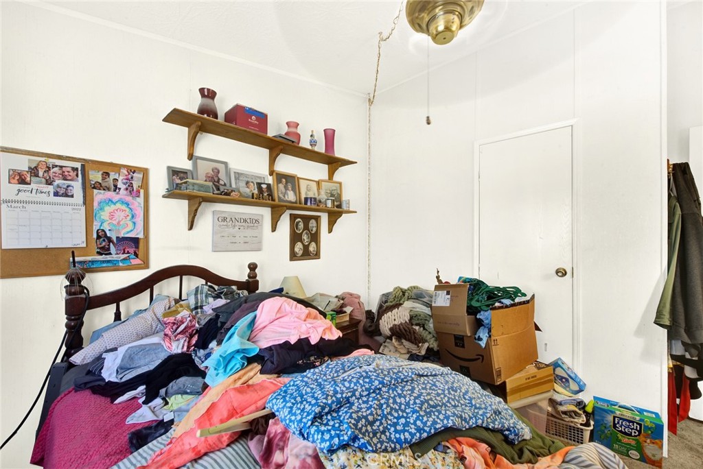 521 East Divisadero Corning, CA 96021 - Photo 47 of 54 a bedroom with bed and a window