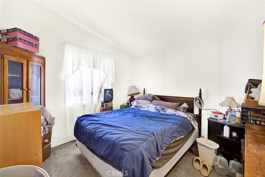 521 East Divisadero Corning, CA 96021 - Photo 49 of 54 a bedroom with a bed and dresser