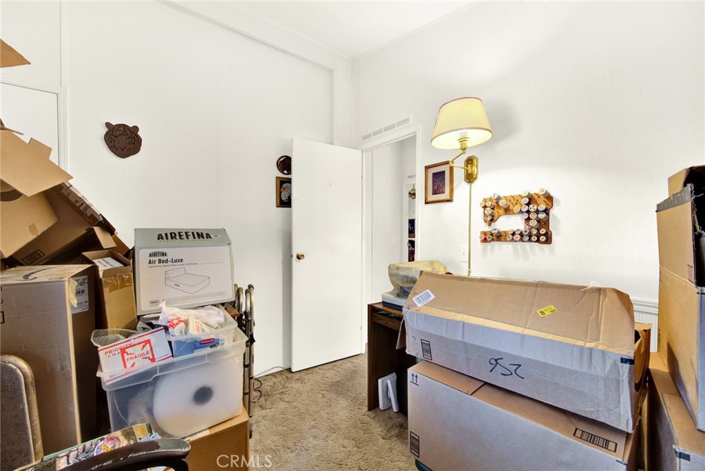 521 East Divisadero Corning, CA 96021 - Photo 52 of 54 a room with a desk and couch