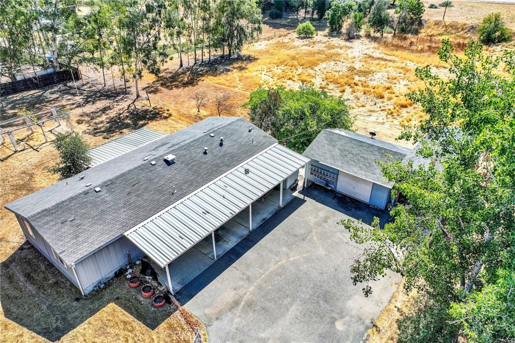 521 East Divisadero Corning, CA 96021 - Photo 54 of 54 a view of a roof deck with wooden floor and fence