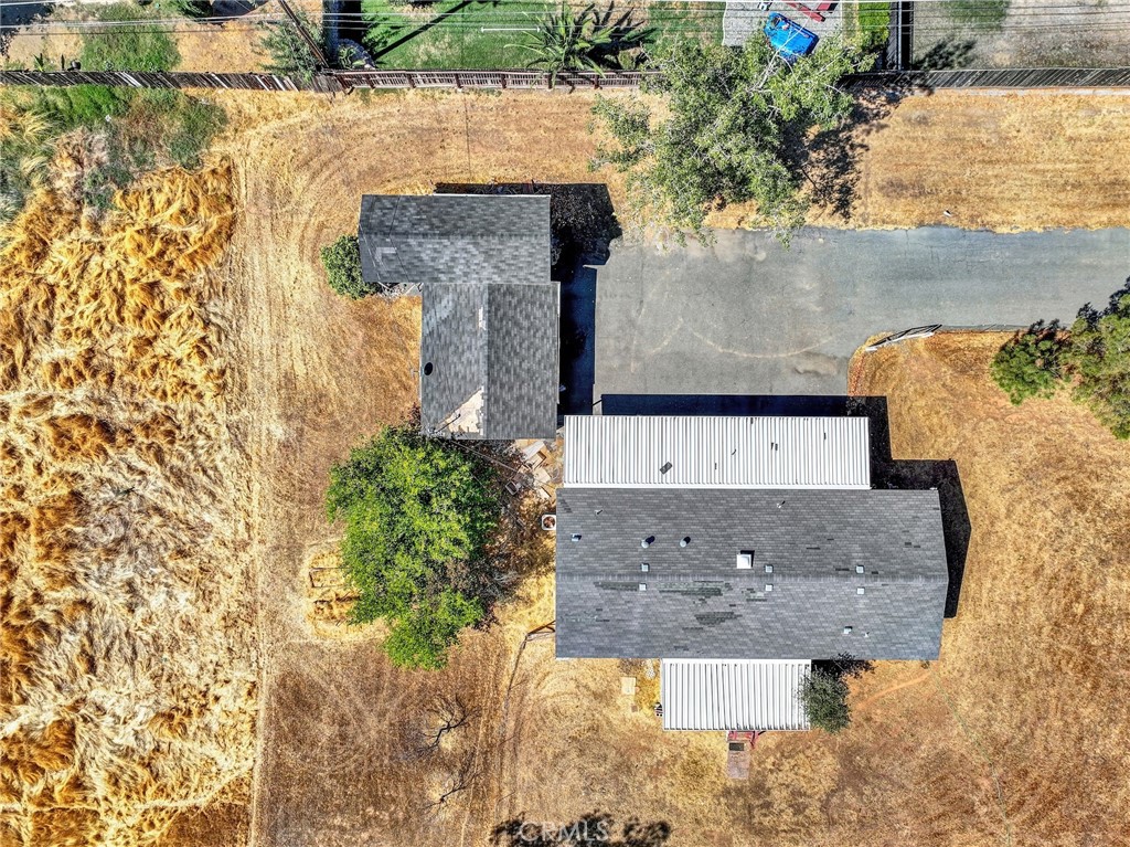 521 East Divisadero Corning, CA 96021 - Photo 7 of 54 an aerial view of a house with a yard