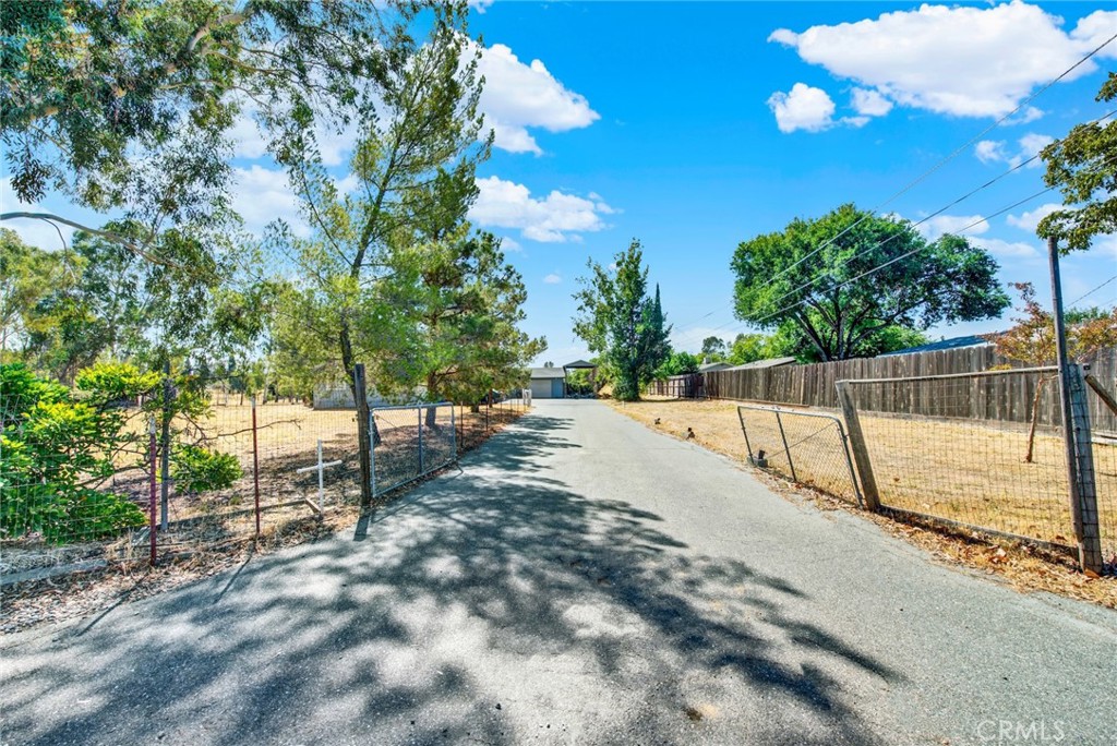 521 East Divisadero Corning, CA 96021 - Photo 8 of 54 a view of yard with swimming pool and sitting area