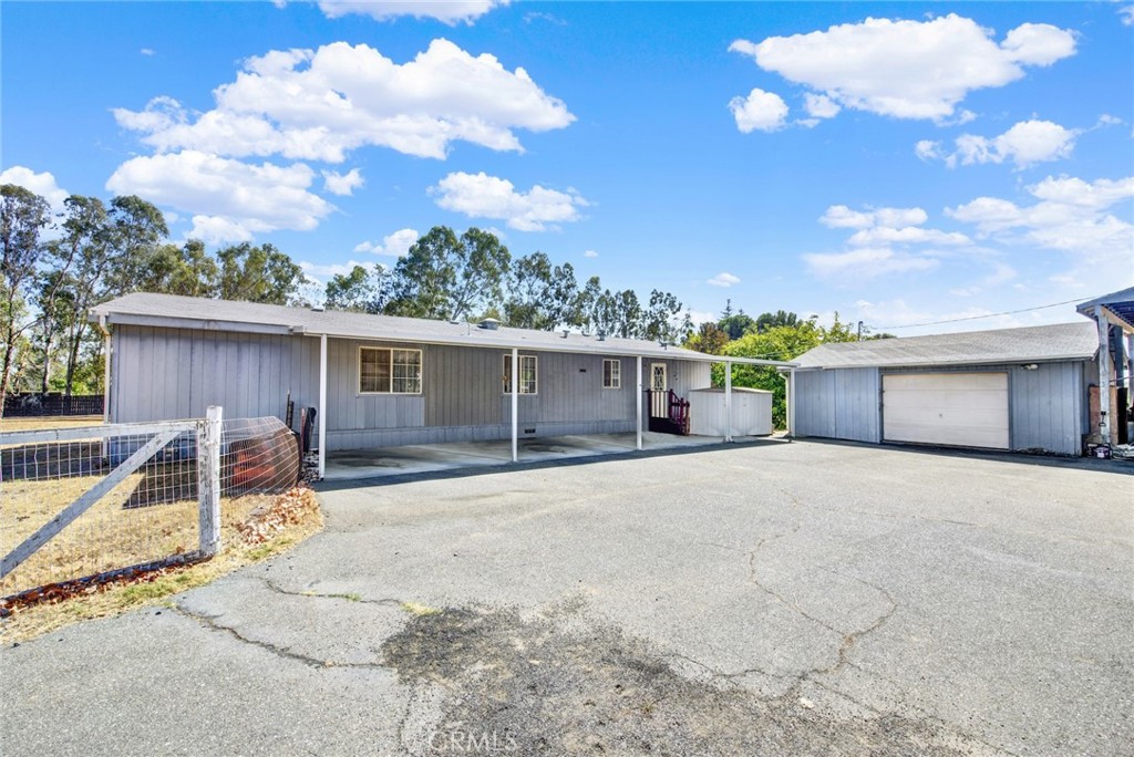 521 East Divisadero Corning, CA 96021 - Photo 10 of 54 a house view with a backyard space
