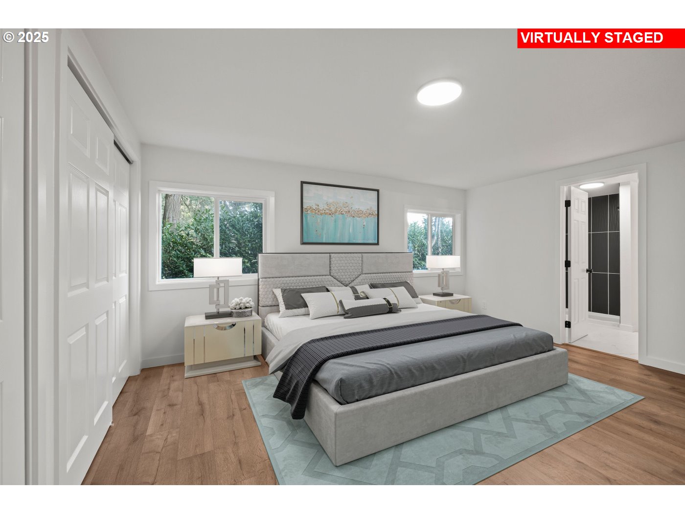 16000 Southeast Powell Boulevard, Unit 34 Portland, OR 97236 - Photo 11 of 28 a bedroom with a large bed and a large window