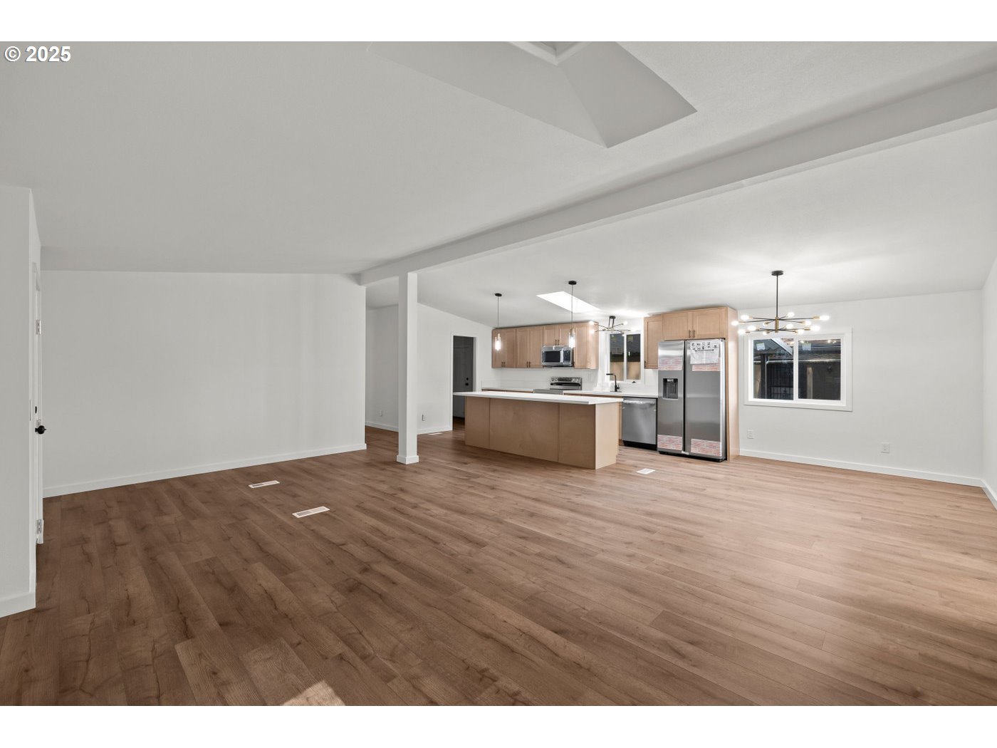 16000 Southeast Powell Boulevard, Unit 34 Portland, OR 97236 - Photo 10 of 28 a view of a livingroom with furniture nad wooden floor