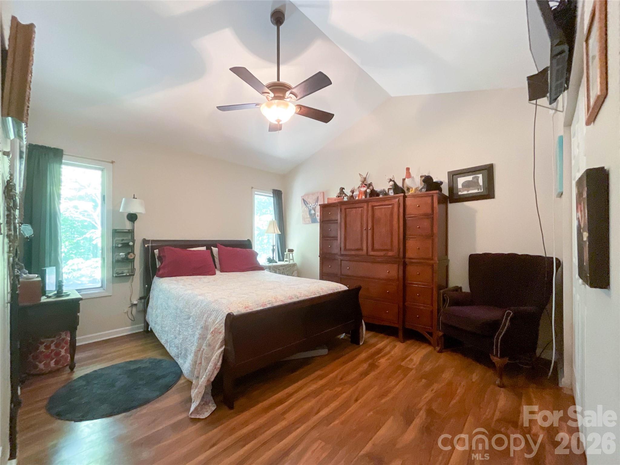 7200 Nesbit Road Waxhaw, NC 28173 - Photo 12 of 46 a bedroom with a bed and wooden floor