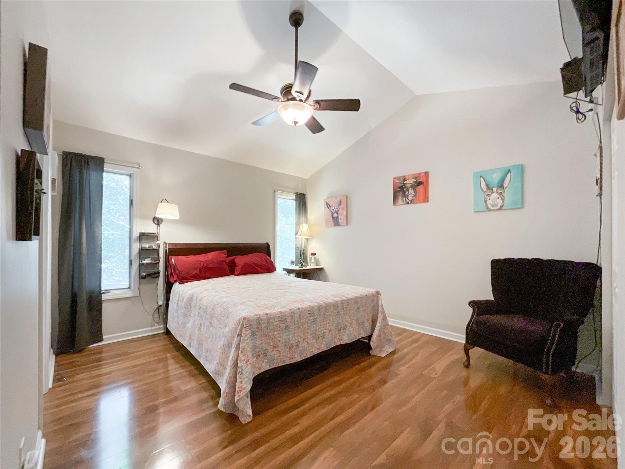 7200 Nesbit Road Waxhaw, NC 28173 - Photo 28 of 46 a bedroom with a bed and furniture