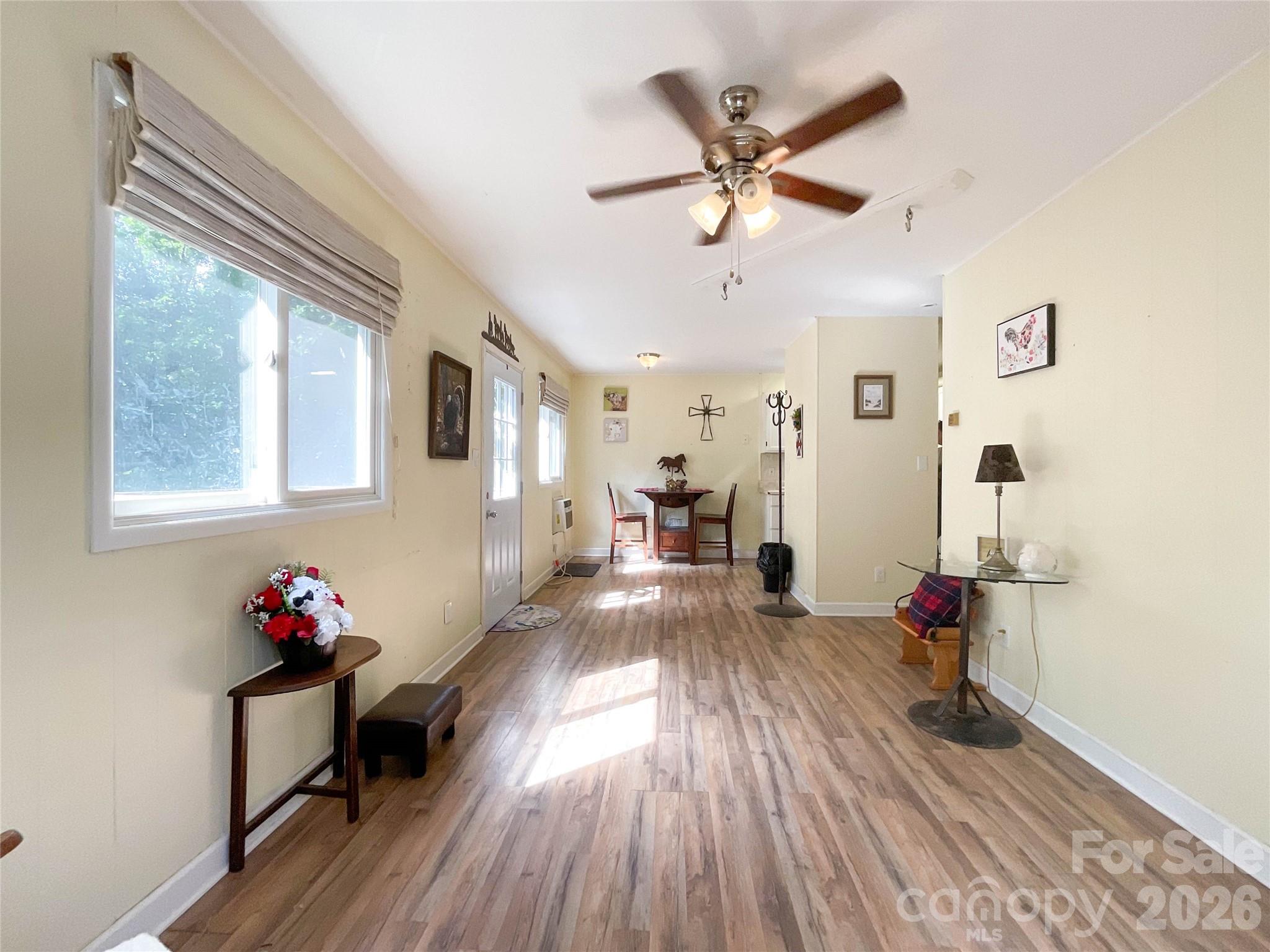 7200 Nesbit Road Waxhaw, NC 28173 - Photo 38 of 46 a living room with furniture and a wooden floor