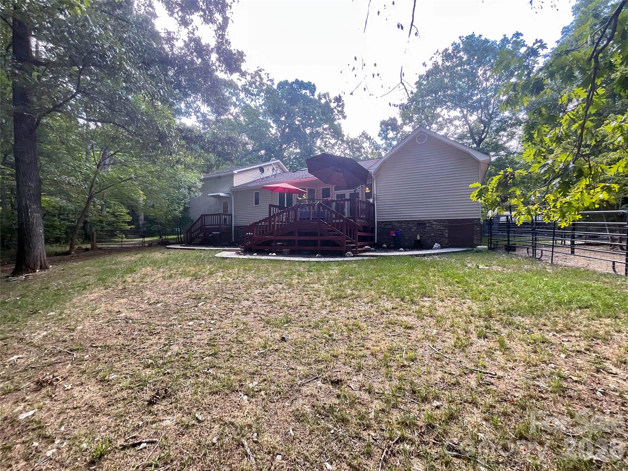7200 Nesbit Road Waxhaw, NC 28173 - Photo 44 of 46 a house view with a garden space