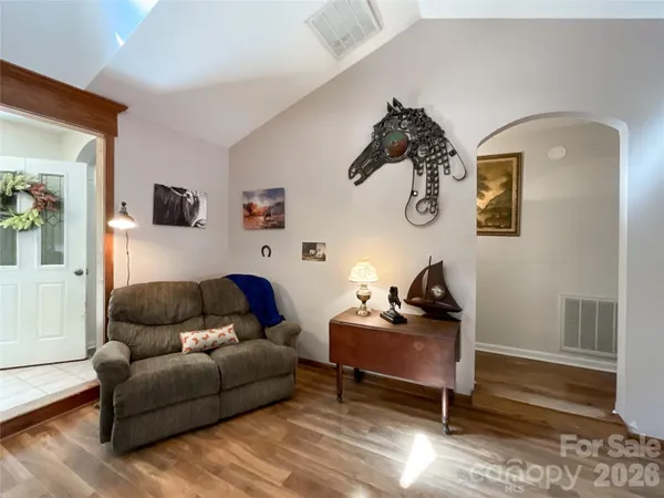 a bedroom with bed and a window