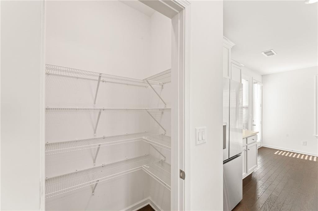 4734 Dewitt Drive Duluth, GA 30097 - Photo 14 of 31 a view of a room with racks on the wall