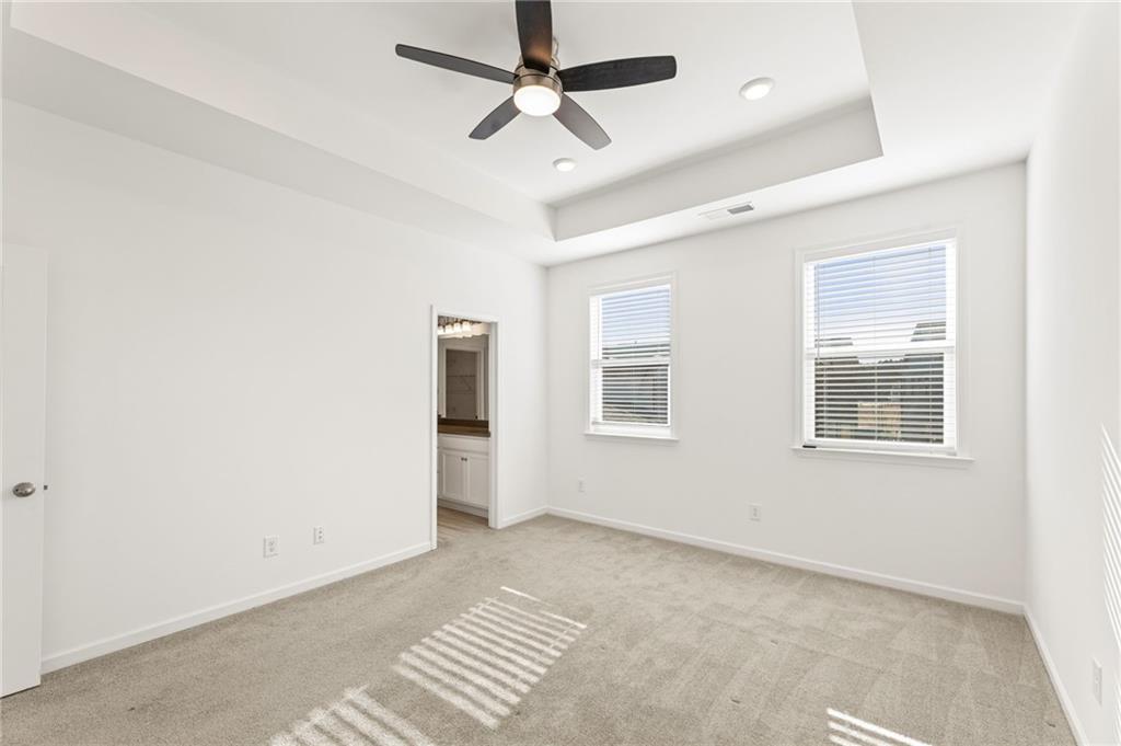 4734 Dewitt Drive Duluth, GA 30097 - Photo 22 of 31 a view of an empty room with a window