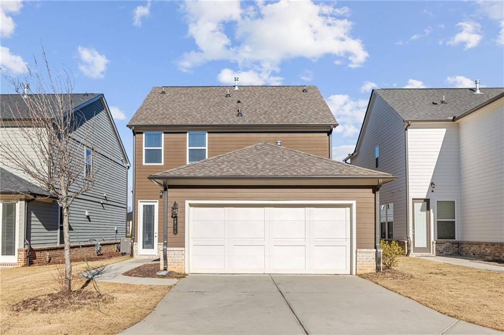 4734 Dewitt Drive Duluth, GA 30097 - Photo 31 of 31 a front view of a house with a garage