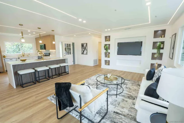 a view of a room that has a table and chair in it