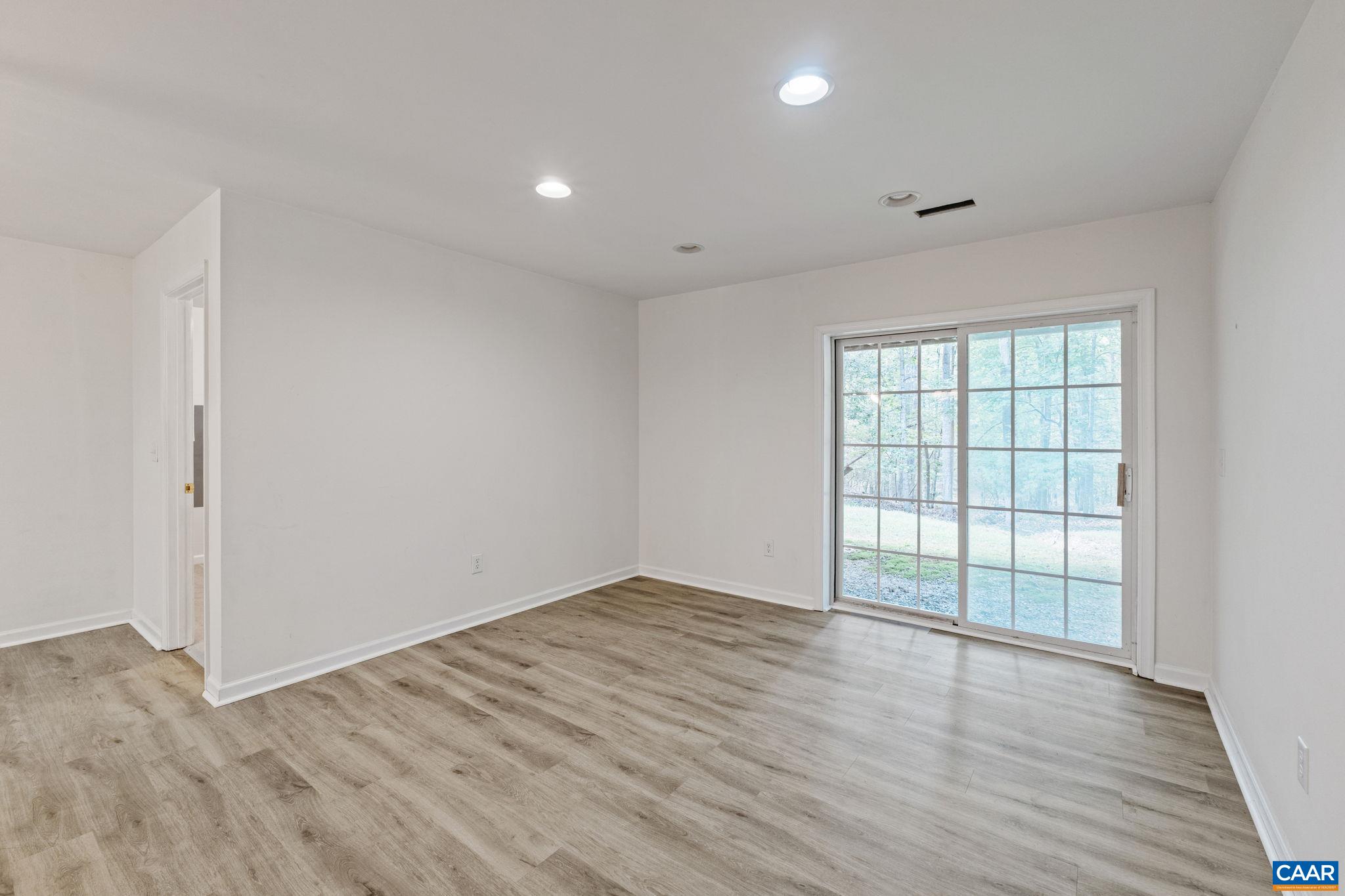 12 Cliftwood Road Palmyra, VA 22963 - Photo 38 of 47 wooden floor in an empty room with a window