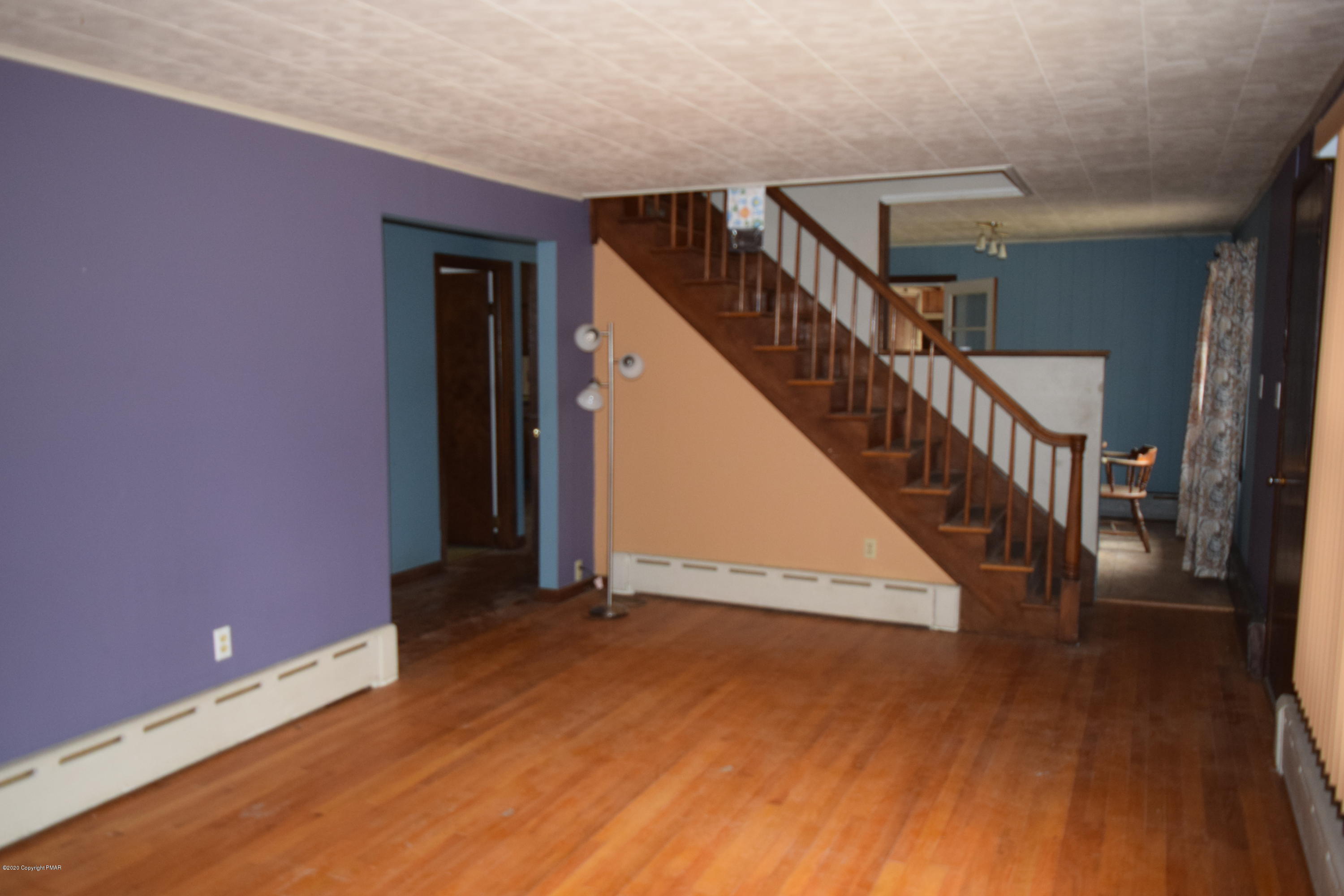 100B River Road Thornhurst, PA 18424 - Photo 14 of 32 staircase to 2nd floor