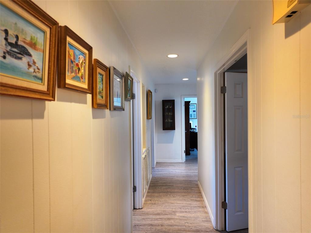 4501 Detour Road Haines City, FL 33844 - Photo 14 of 65 a view of a hallway with wooden floor