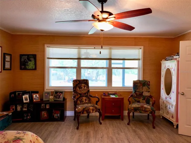 a room with a bed and a window