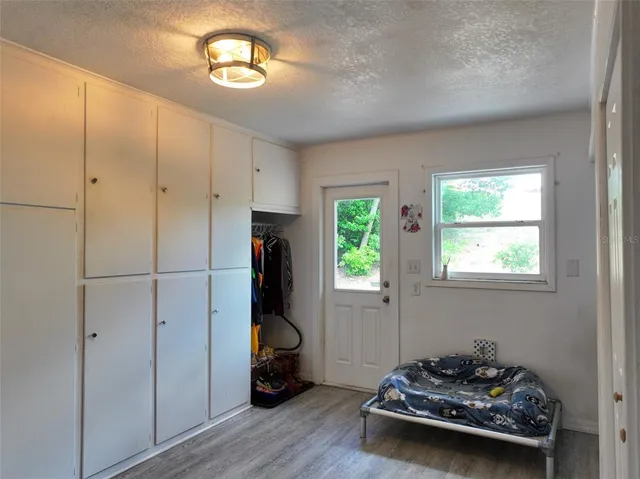 a room with furniture and a window