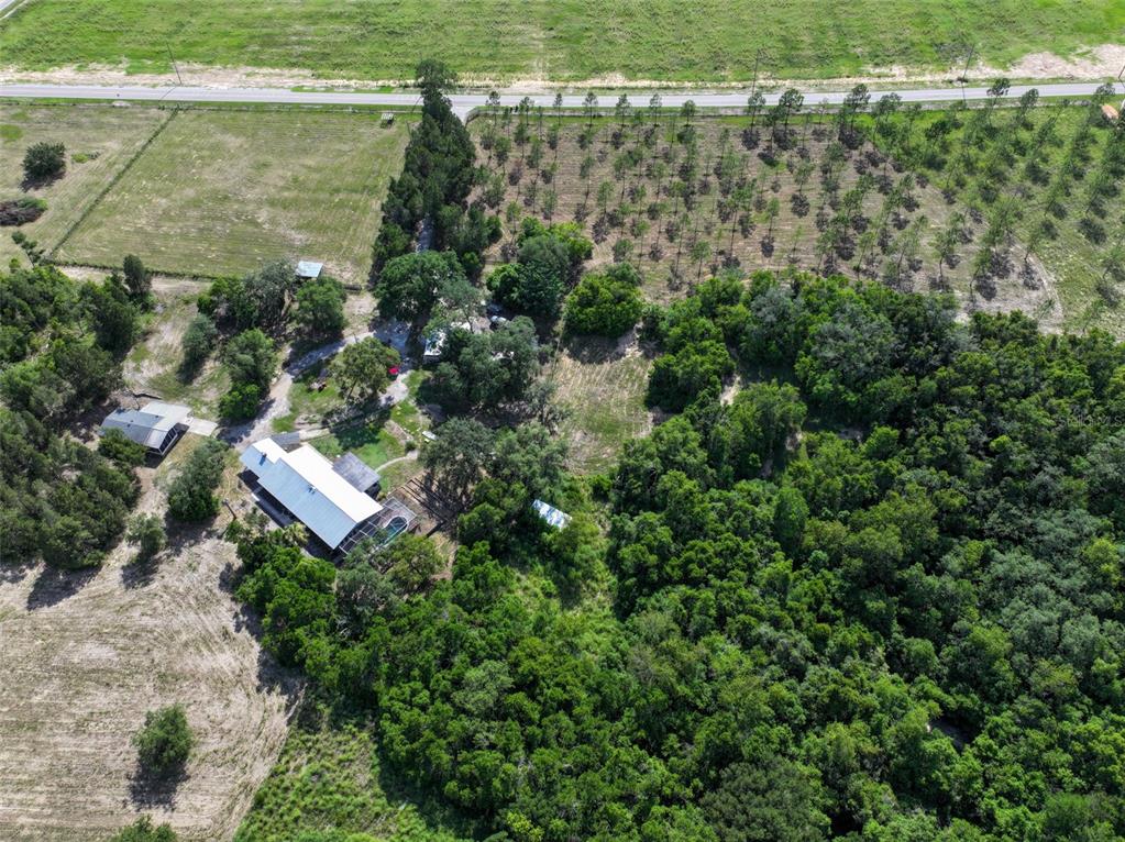4501 Detour Road Haines City, FL 33844 - Photo 52 of 65 a view of a lake with a building in the background