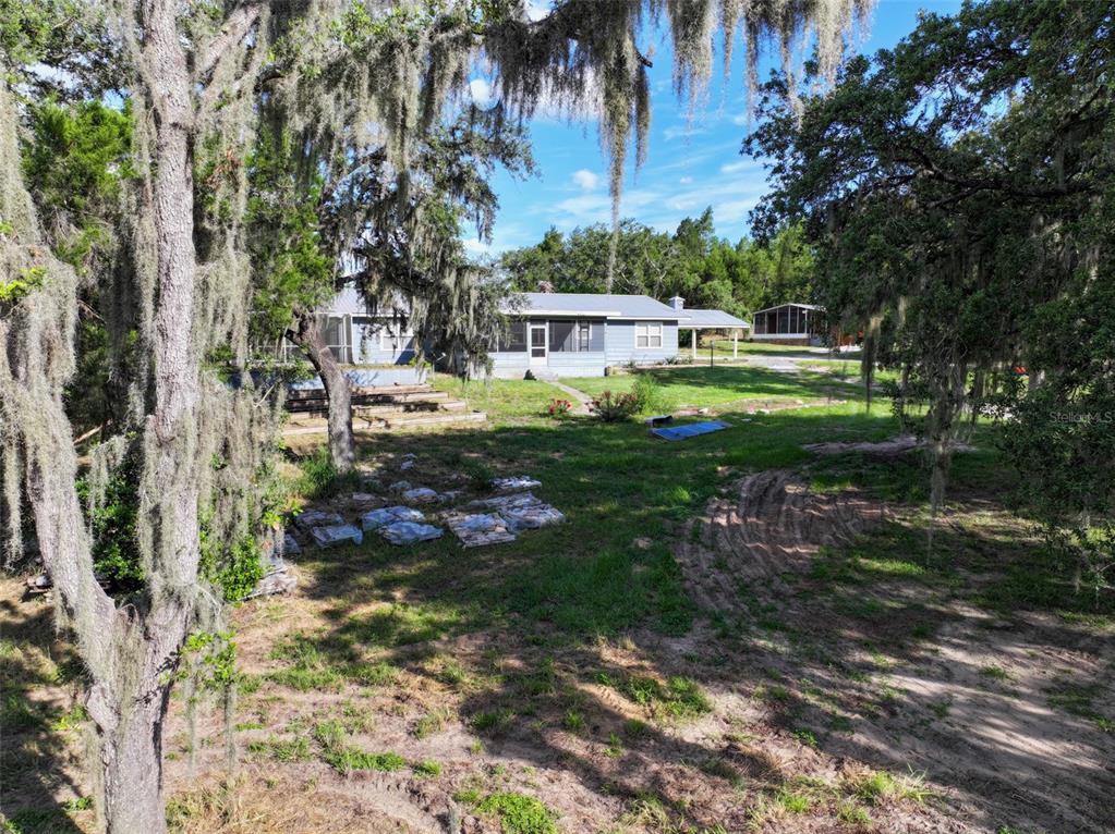 4501 Detour Road Haines City, FL 33844 - Photo 65 of 65 a view of a house with a yard