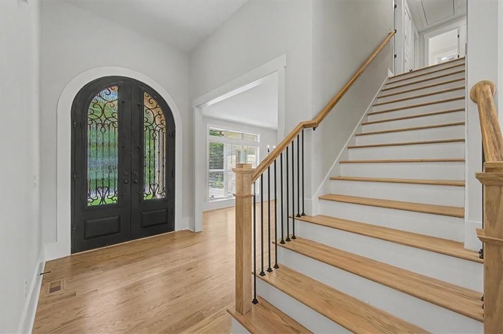217 Laura Lake Road Marietta, GA 30066 - Photo 7 of 54 a view of a entryway door with wooden floor and a living room