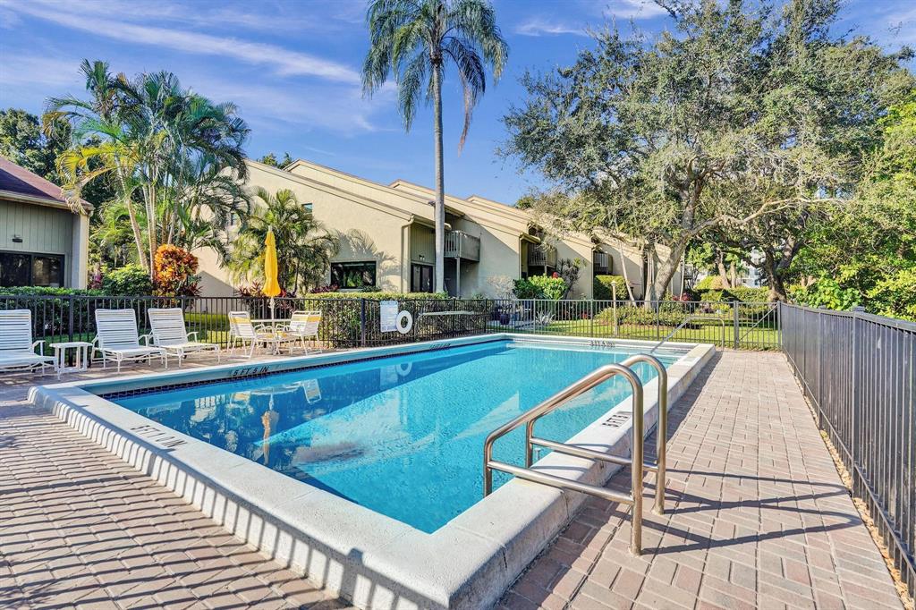 81 Northeast 17th Court Fort Lauderdale, FL 33305 - Photo 3 of 70 a view of a swimming pool with a patio