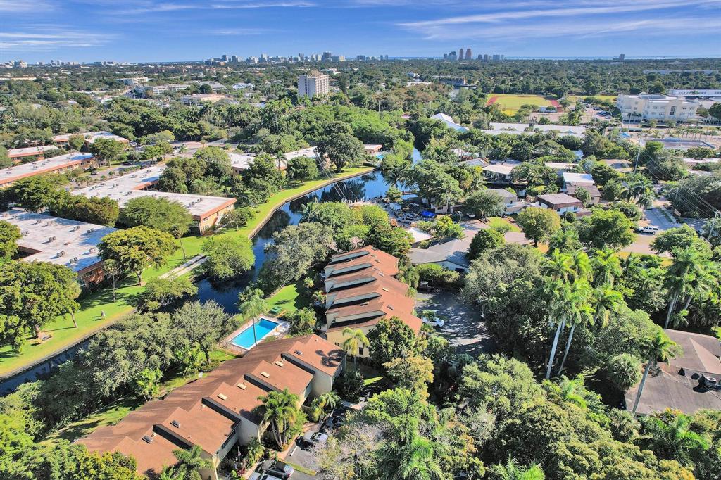 81 Northeast 17th Court Fort Lauderdale, FL 33305 - Photo 70 of 70 an aerial view of a city and mountain view in back