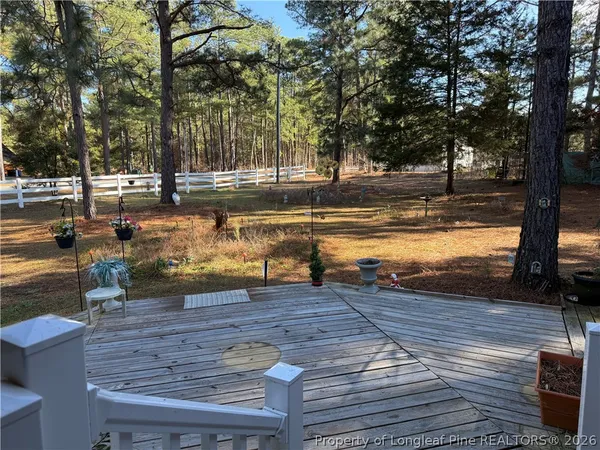 a view of a yard with trees