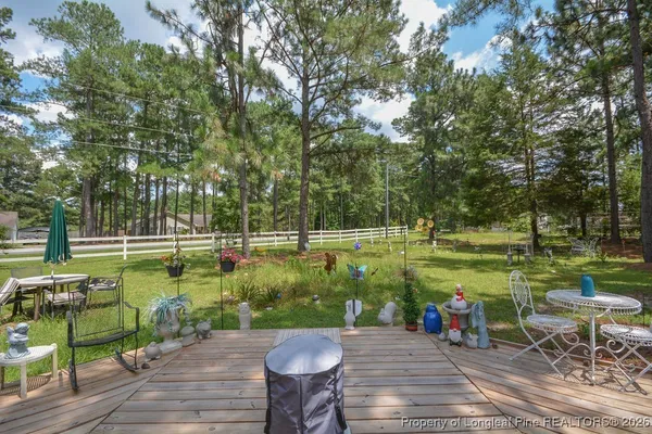 a view of a chairs and tables in patio