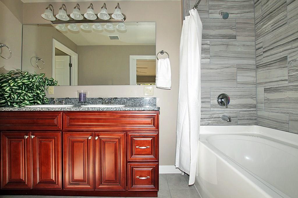110 Rockingham Lane Canonsburg, PA 15317 - Photo 16 of 25 MASTER BATH WITH PORCELAIN TILE AROUND SOAKING TUB