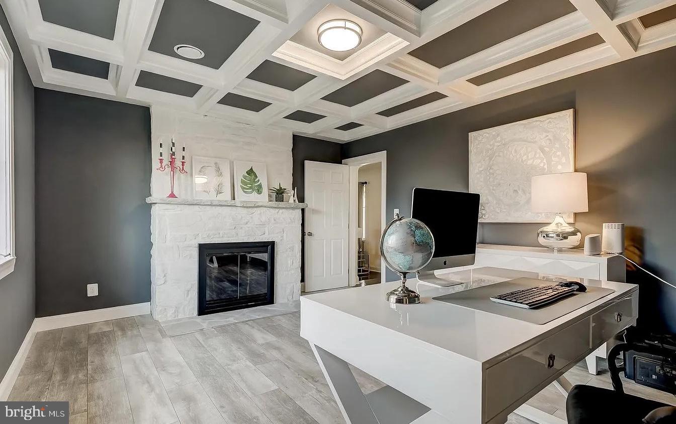 8040 Leishear Road Laurel, MD 20723 - Photo 18 of 66 a living room with furniture and a fireplace