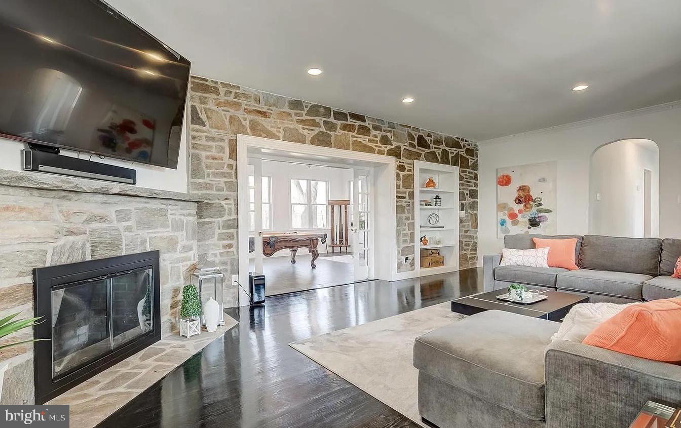 8040 Leishear Road Laurel, MD 20723 - Photo 20 of 66 a living room with furniture and a fireplace