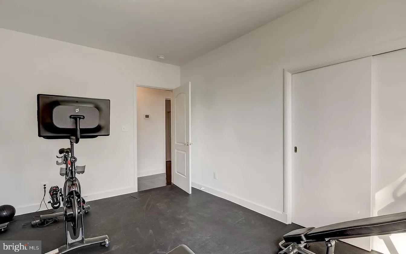8040 Leishear Road Laurel, MD 20723 - Photo 24 of 66 a view of a room with gym equipment