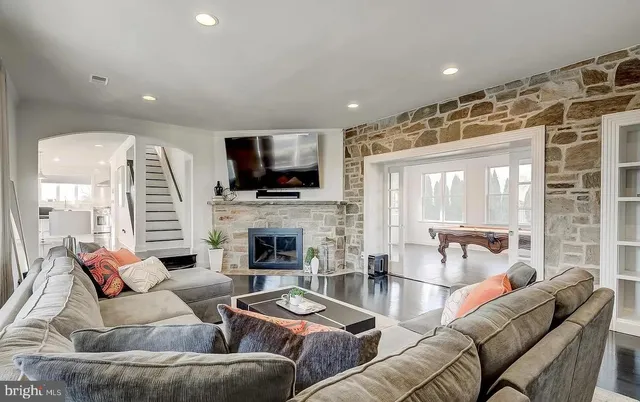 a kitchen with granite countertop a stove and a sink