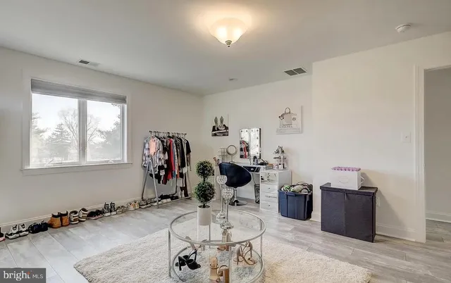 a view of a hallway with stairs