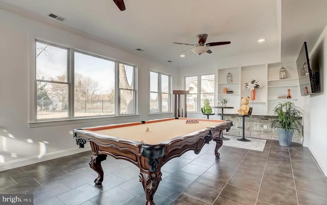 8040 Leishear Road Laurel, MD 20723 - Photo 32 of 66 a room with pool table and windows