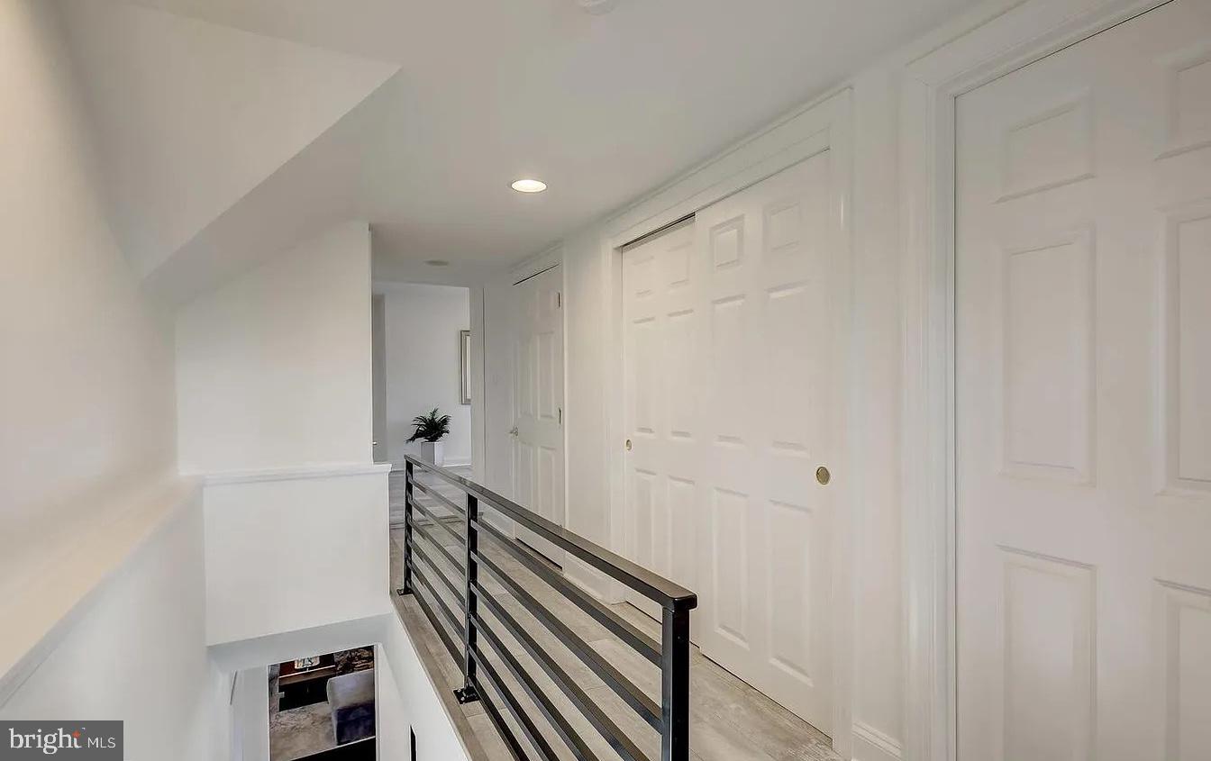 8040 Leishear Road Laurel, MD 20723 - Photo 38 of 66 a view of a hallway with stairs
