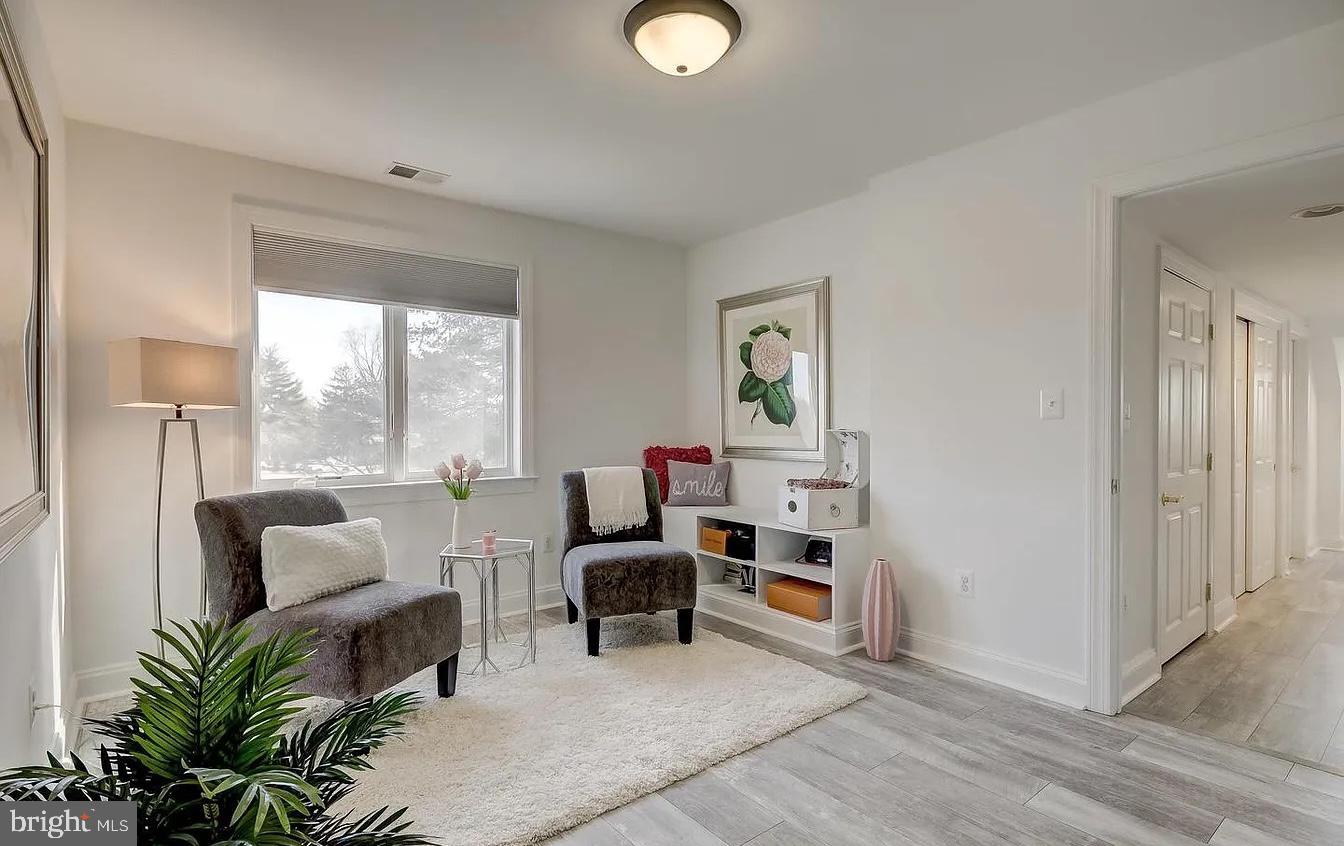 8040 Leishear Road Laurel, MD 20723 - Photo 39 of 66 a living room with furniture and a window