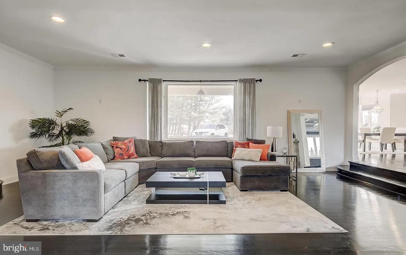 8040 Leishear Road Laurel, MD 20723 - Photo 40 of 66 a living room with furniture and a large window