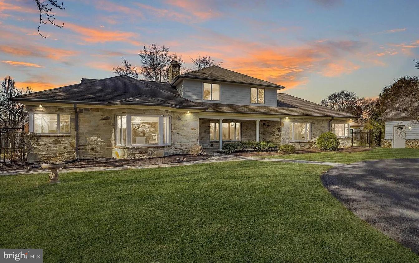 8040 Leishear Road Laurel, MD 20723 - Photo 4 of 66 a front view of a house with a garden
