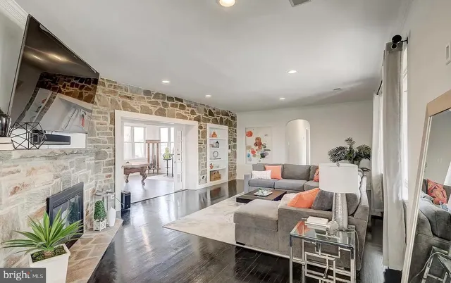 a view of a house with snow on the road