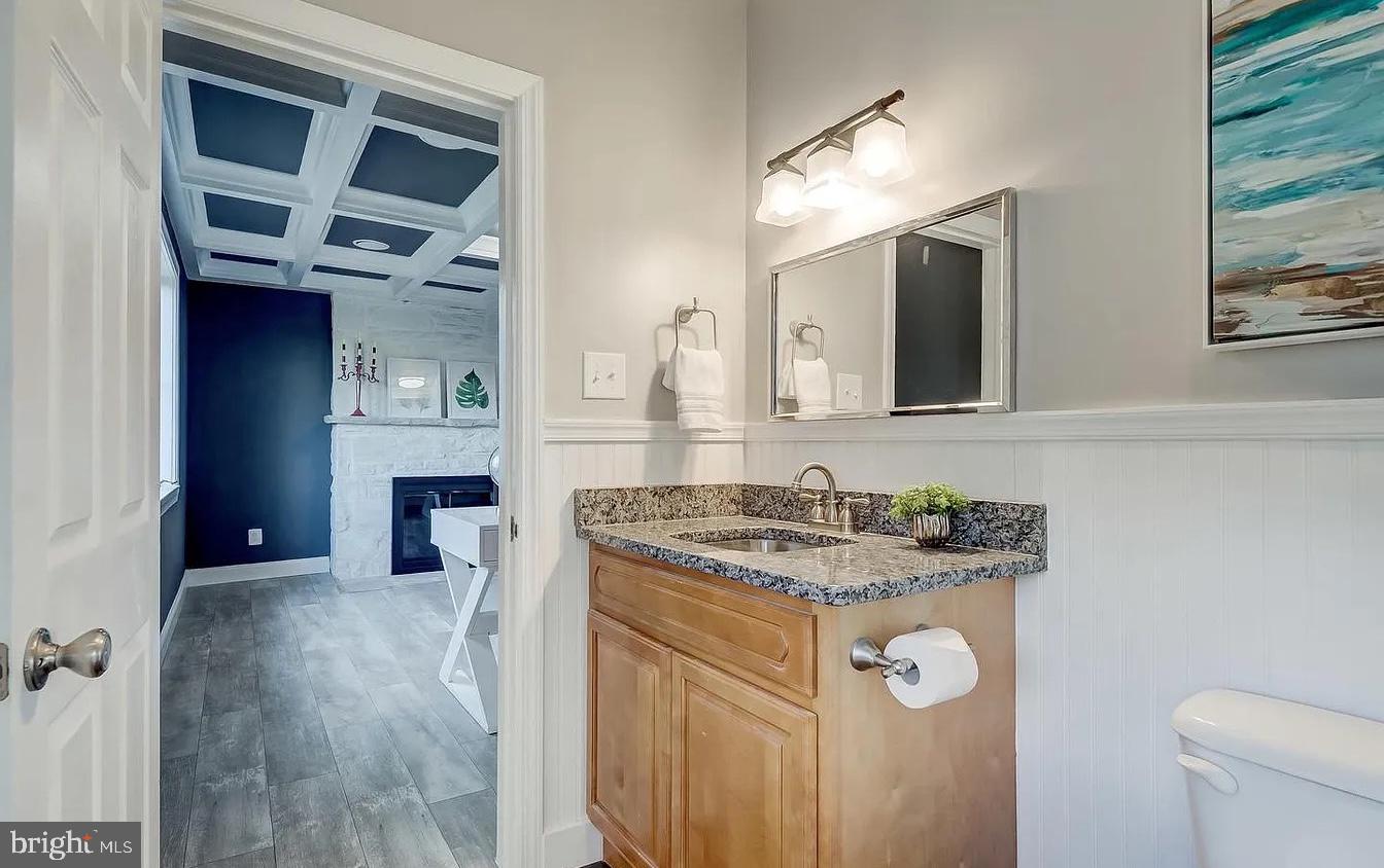 8040 Leishear Road Laurel, MD 20723 - Photo 58 of 66 a bathroom with a sink and a mirror