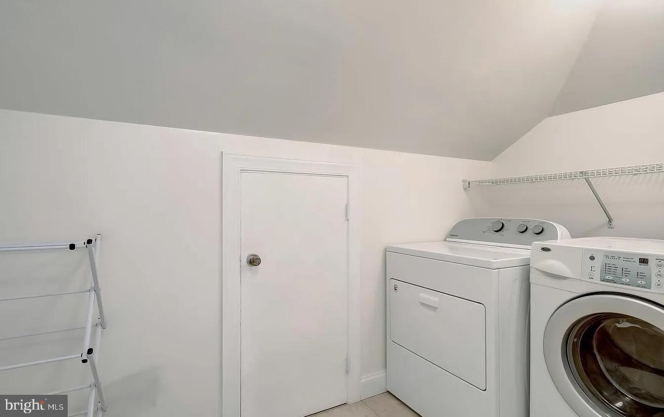 8040 Leishear Road Laurel, MD 20723 - Photo 60 of 66 a view of storage and utility room with washer and dryer