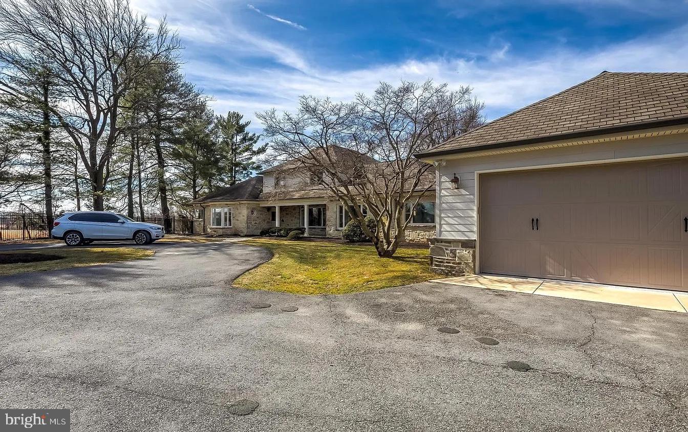 8040 Leishear Road Laurel, MD 20723 - Photo 64 of 66 a view of a house with snow on the road